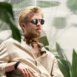 Arkai Occasus | Lunettes De Soleil En Titane Gris Anthracite à Verres Ronds Polarisés 8 Arkai Occasus | Lunettes De Soleil En Titane Gris Anthracite à Verres Ronds Polarisés -Boutique Trendhim rst spring 23 arkai sunglasses goldandsilver 1c 1